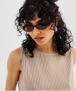 Blouse sans manches ample courte et fluide femme